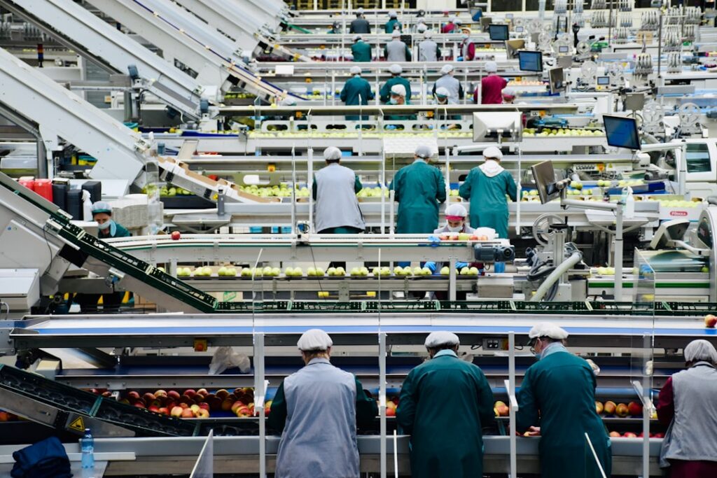 Workers in a production facility representing labor productivity and output